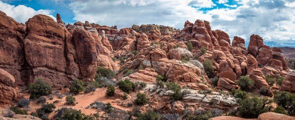 The Fiery Furnace is a natural labyrinth of narrow passages between towering sandstone walls. To enter the Fiery Furnace, visitors must accompany a ranger-guided tour or obtain a hiking permit at the visitor center. Arches National Park is located on the Colorado River 4 miles north of Moab, Utah. It is known for containing over 2,000 natural sandstone arches, including the world-famous Delicate Arch, in addition to hundreds of soaring pinnacles, massive fins and giant balanced rocks.